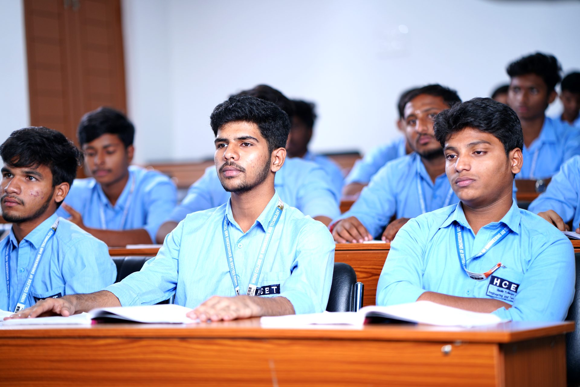 Students attentively listening in a classroom